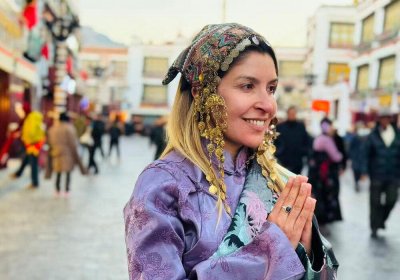 Traveler photo: In the ancient alleys of Barkhor Street in Lhasa, Tibet, our guest in traditional Tibetan attire is taking commemorative photos. (December 2025)