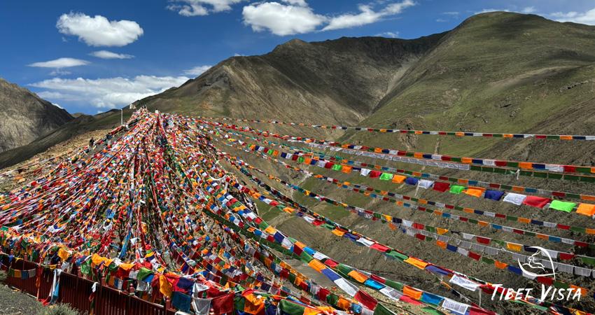 The striking and colorful Tibetan prayer flags at the mountain pass in Tibet