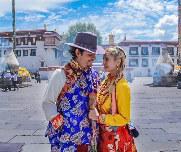 couple travelers dressed in traditional costumes in lhasa for photoshoot