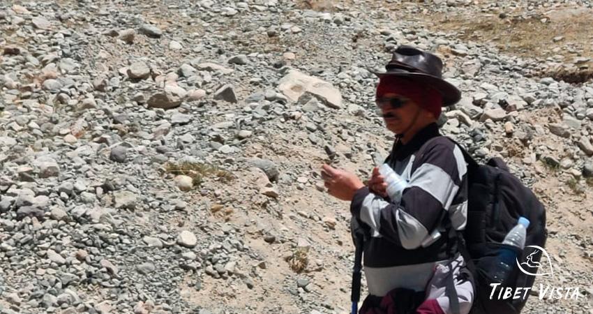 Pause to rest and drink water to stay hydrated during the Mt. Kailash trek