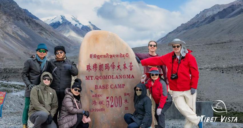 Celebrating our successful EBC visit by taking a photo at the Mount Everest marker