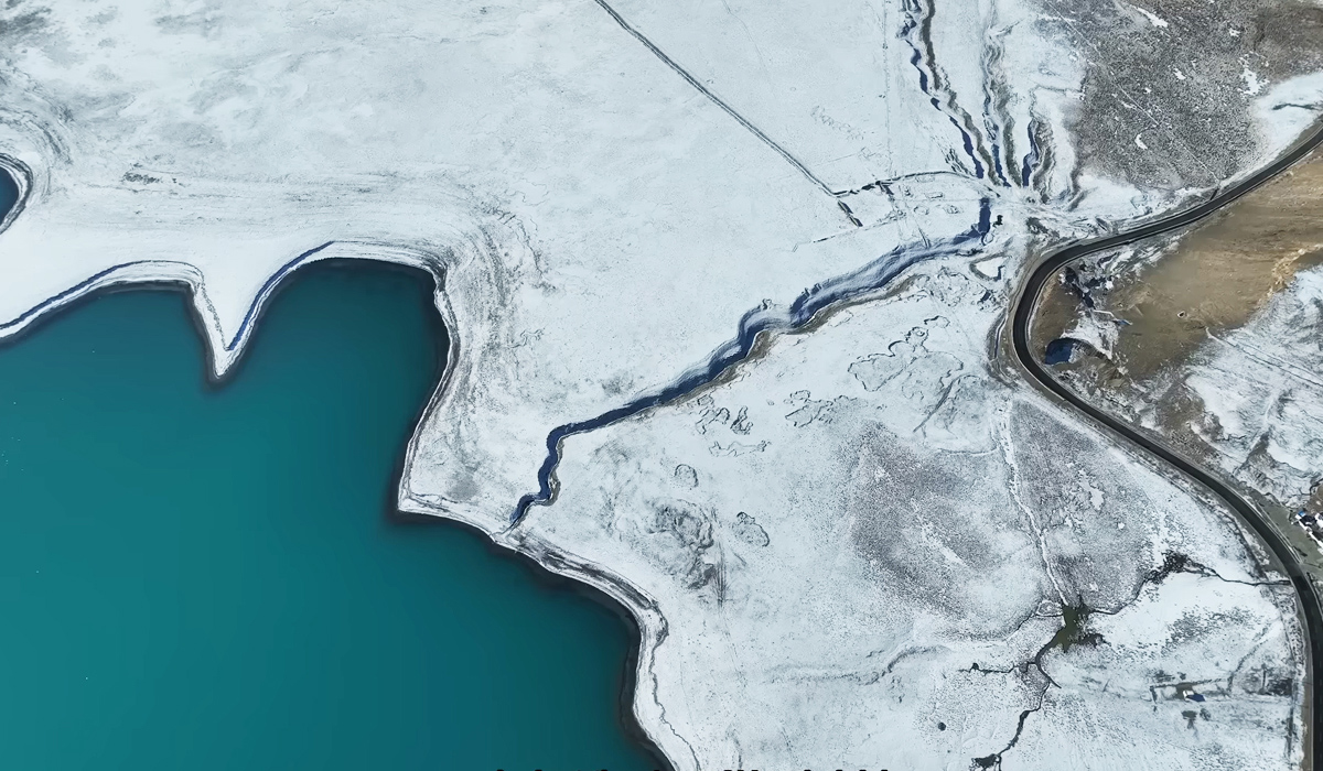 Yamdrok Lake and Snow-Covered Landscape