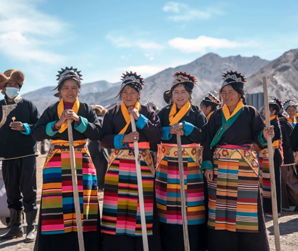 well-dressed female tibetan villagers